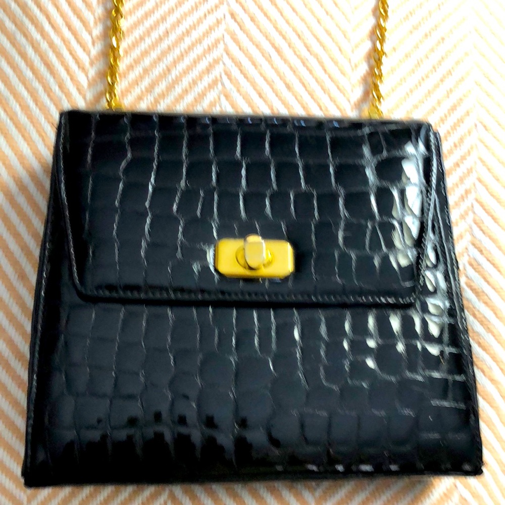 Norman Marcus Collection patent leather quilted bag. Gold chain and buckle!